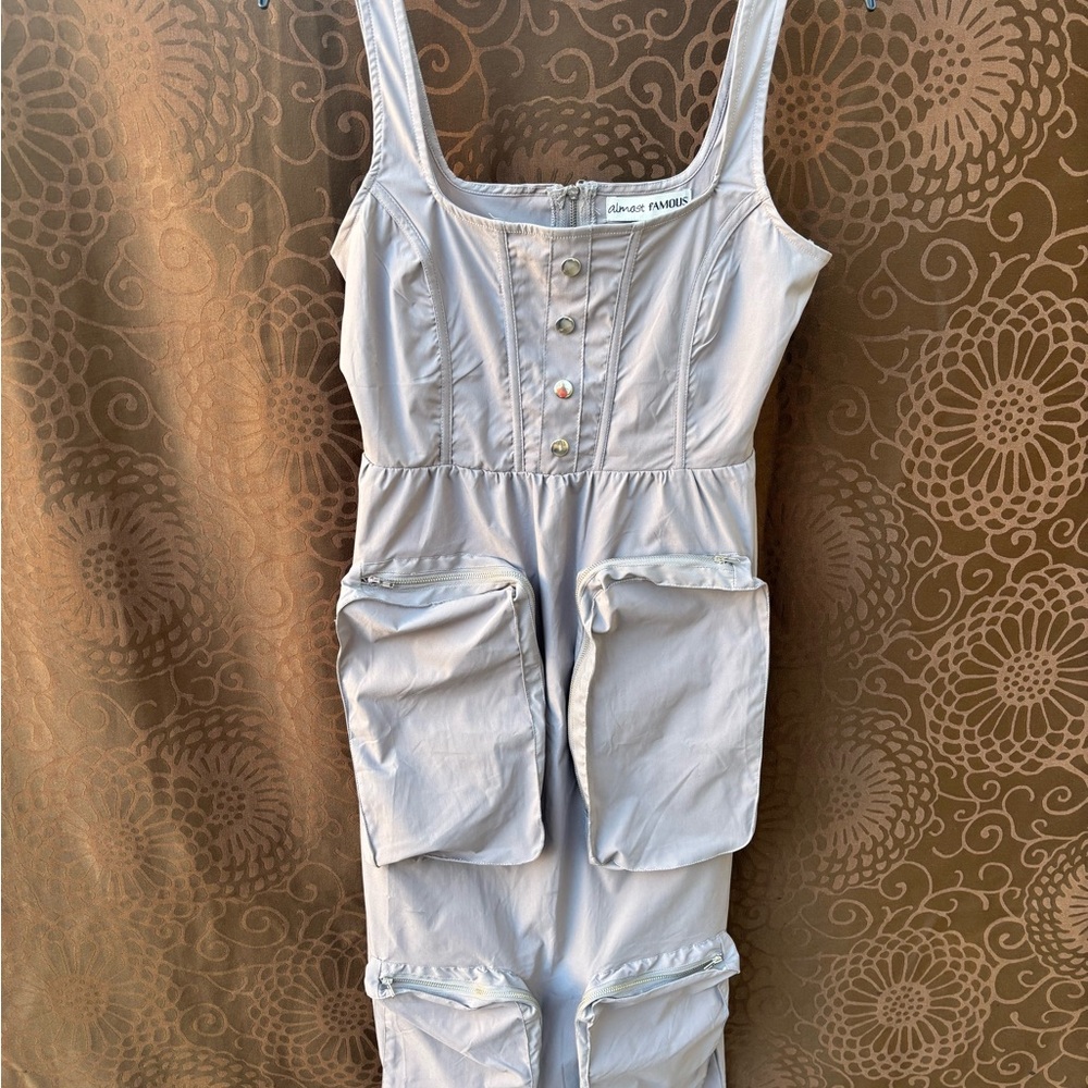 Gray Sleeveless Dress with Pockets and silver zippers/buttons